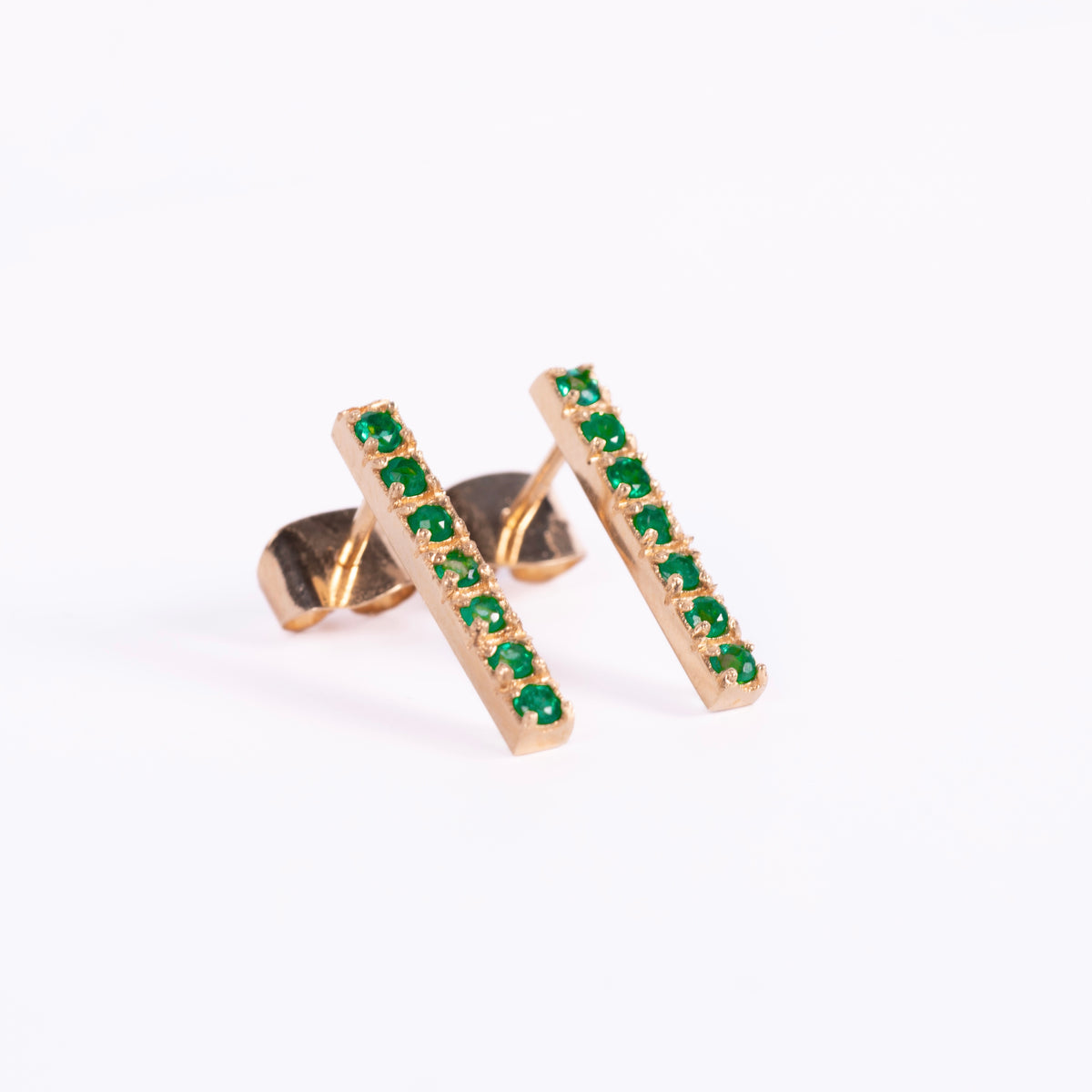Aretes línea esmeralda